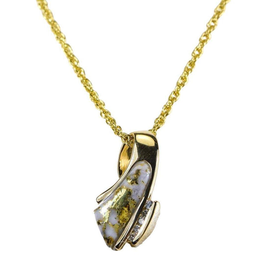 Orocal gold quartz pendant with visible gold patterns in white quartz, a curved gold setting and diamond accents